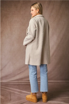 Manteau à boutons et poches zippées cachées – Élégance intemporelle & confort moderne