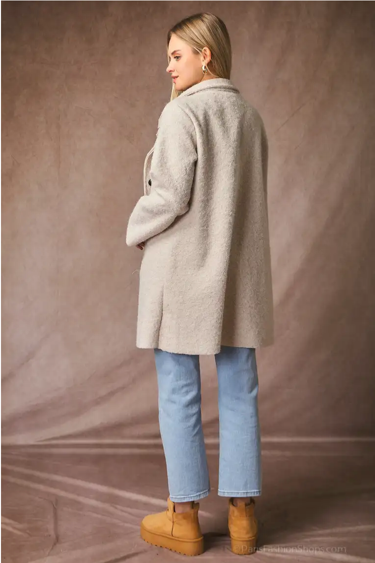 Manteau à boutons et poches zippées cachées – Élégance intemporelle & confort moderne