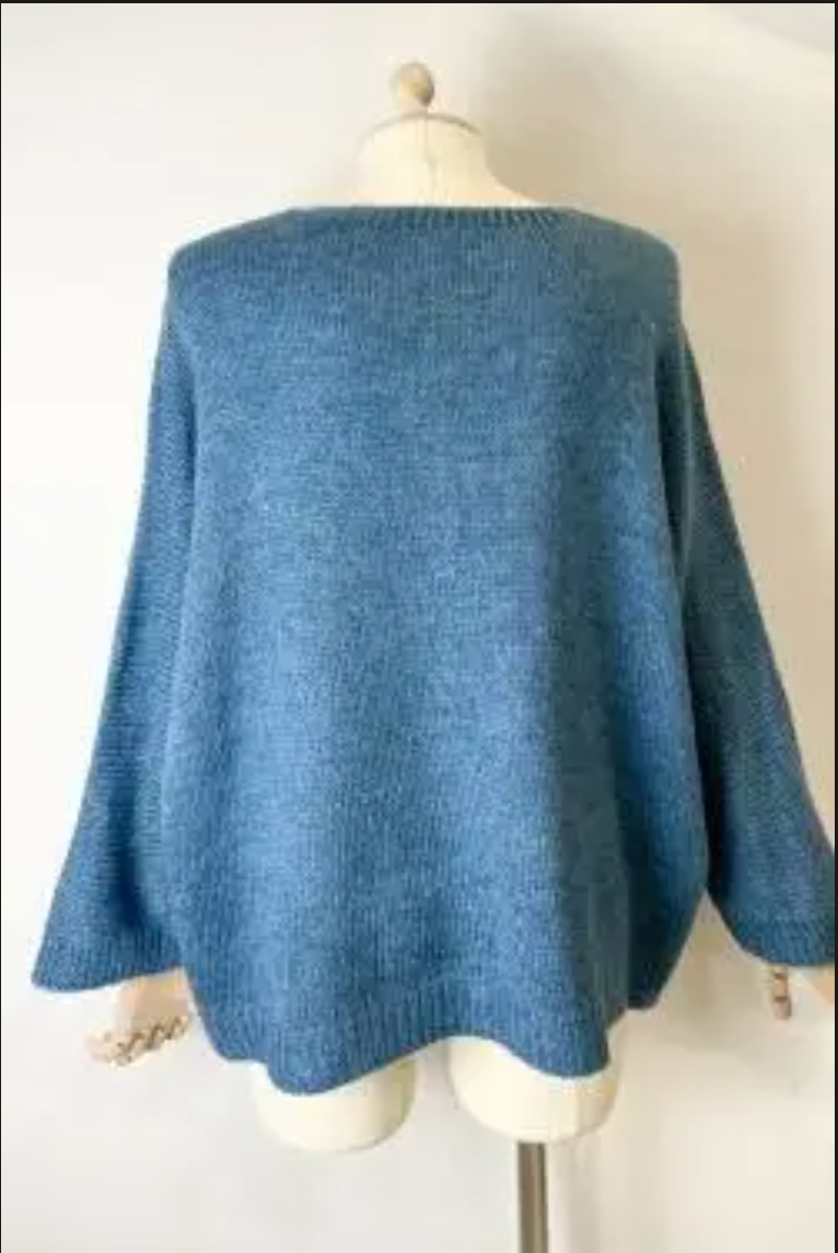 Pull oversize femme chic en maille beige.